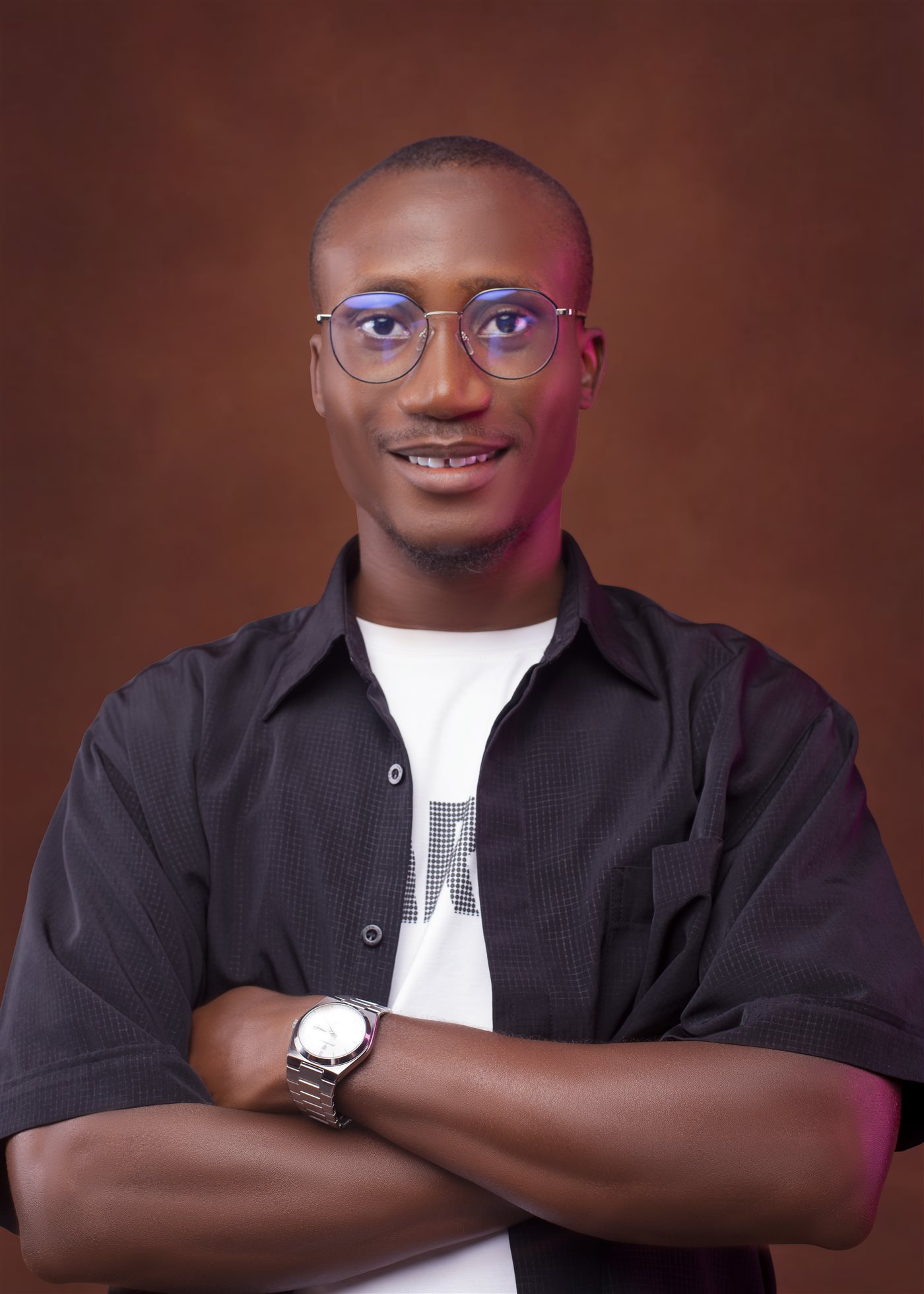 Portrait of Yusuf Mayowa, brand identity and web designer